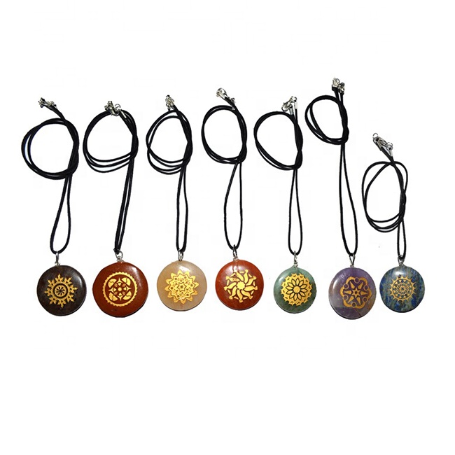 engraved-traditional-chakra-disc-golden-set-pendants-natural.jpg